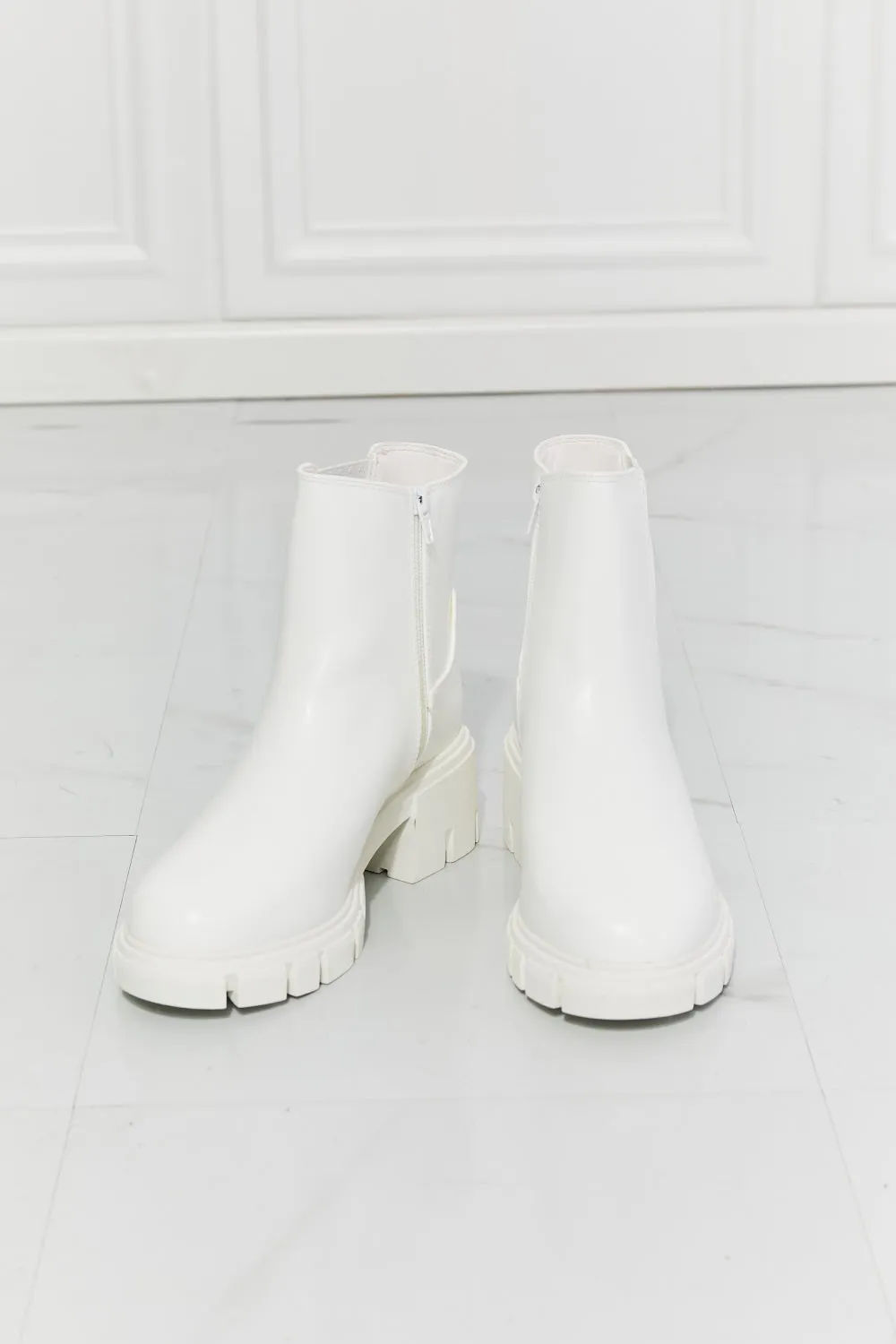 Lug Sole Chelsea Boots in White